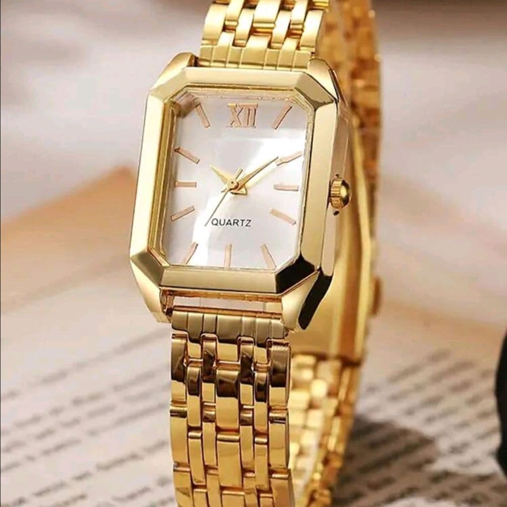 Set de reloj y joyas dorado