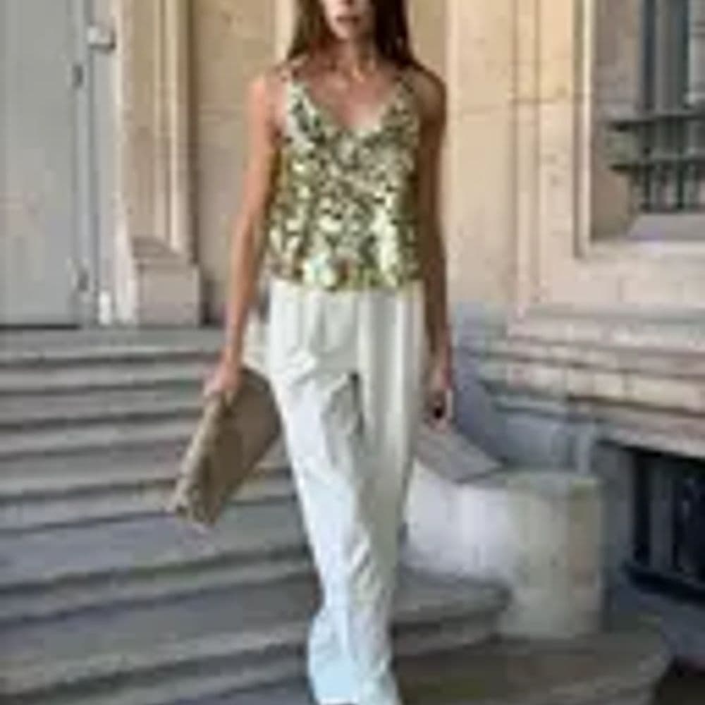 Blusa de lentejuelas doradas